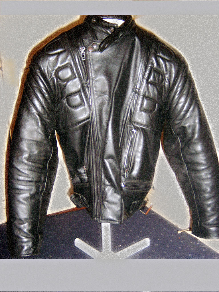 Danny Zuko wearing the original T-Birds Black Leather Jacket on Grease