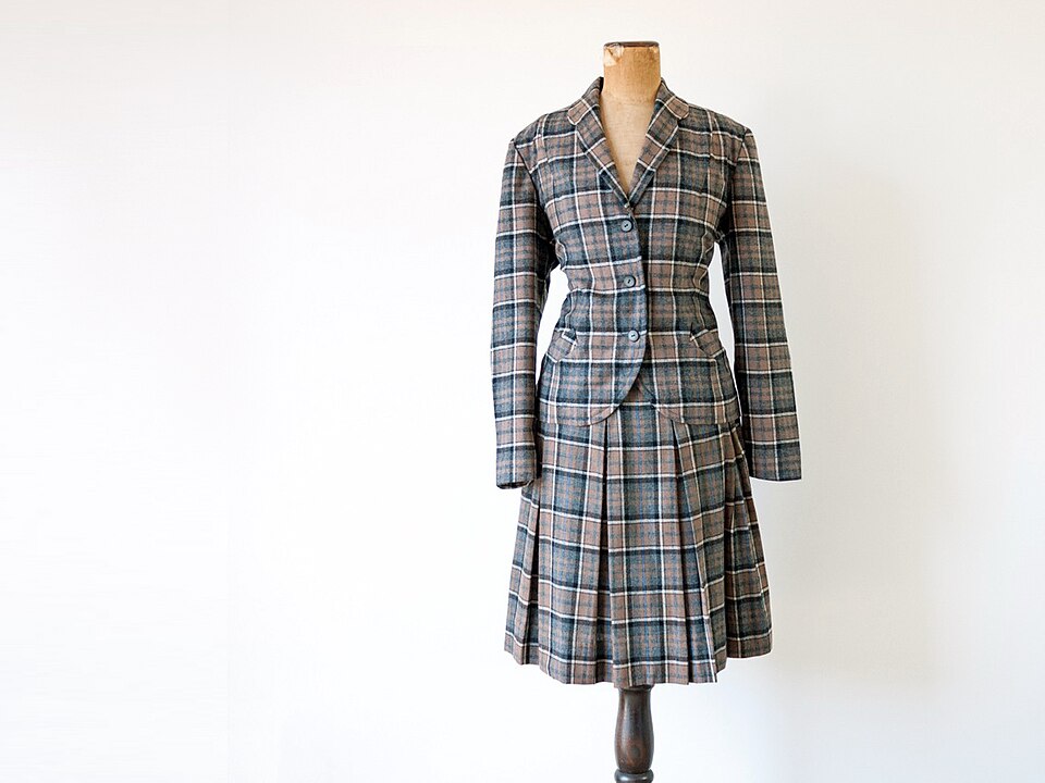 Cher Horowitz wearing the original Pleated Check Mini Skirt on Clueless