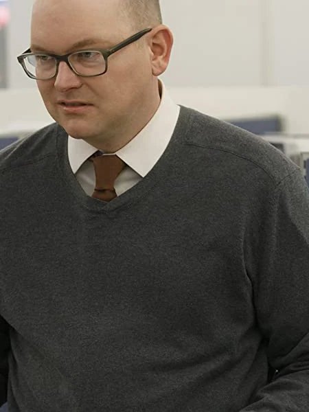 Colin Robinson wearing the original Brown Knit Tie on What We Do in the Shadows