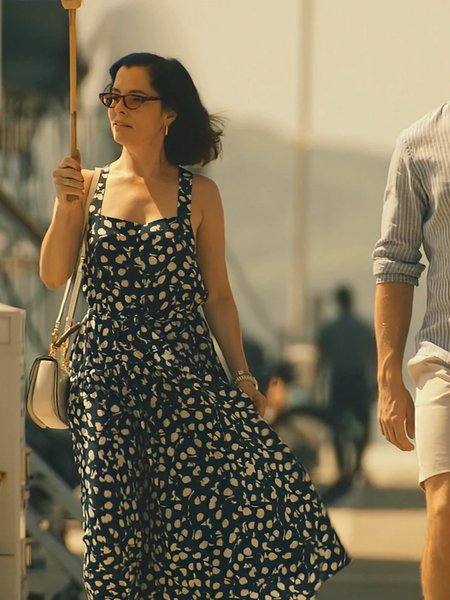 Victoria Ratliff wearing the original Navy Lemon-Print Halter Maxi Dress on The White Lotus